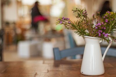 Close-up of flower vase on table