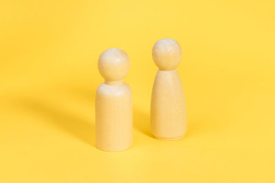 Close-up of toy against yellow background