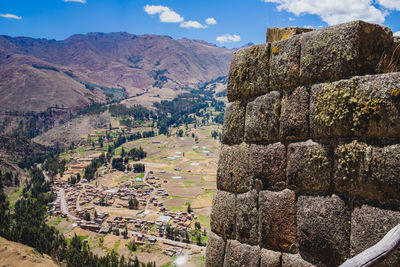 Panoramic view of the landscape and inca wall under blue sky