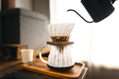 Close-up of coffee cup on table