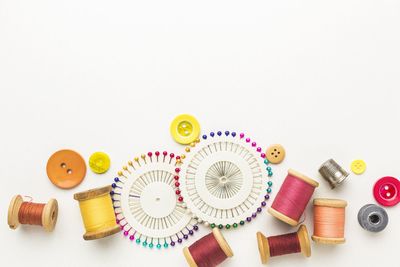 High angle view of various buttons on table
