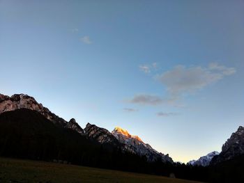 Scenic view of mountains against sky during sunset