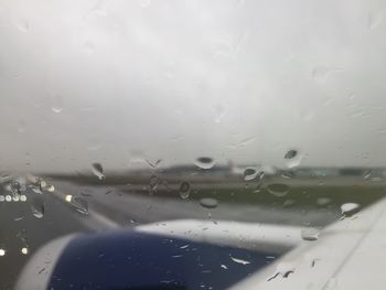 Full frame shot of raindrops on glass window