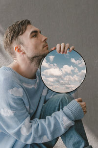 Portrait of young man looking away