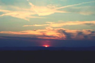 Scenic view of dramatic sky during sunset