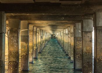 Underneath view of bridge over sea