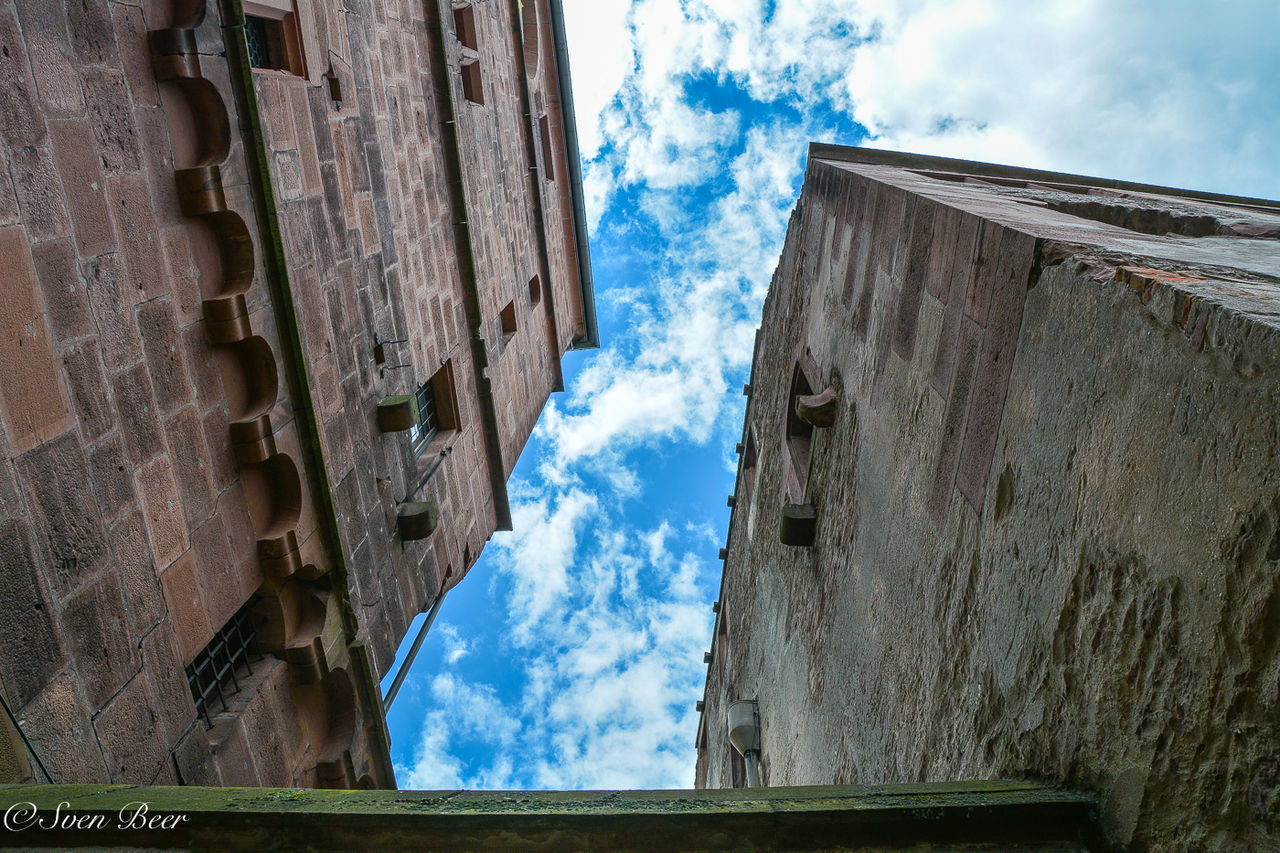 LOW ANGLE VIEW OF BUILDINGS AGAINST SKY