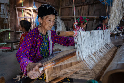 Woman working in shopping cart