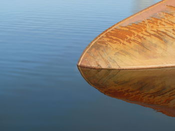 High angle view of wood floating on lake