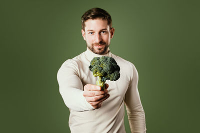 Portrait of boy eating food
