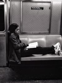 Woman sitting in a room