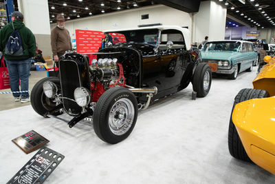 Bicycles parked on street in city during winter