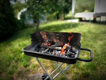 Close-up of fire on barbecue grill