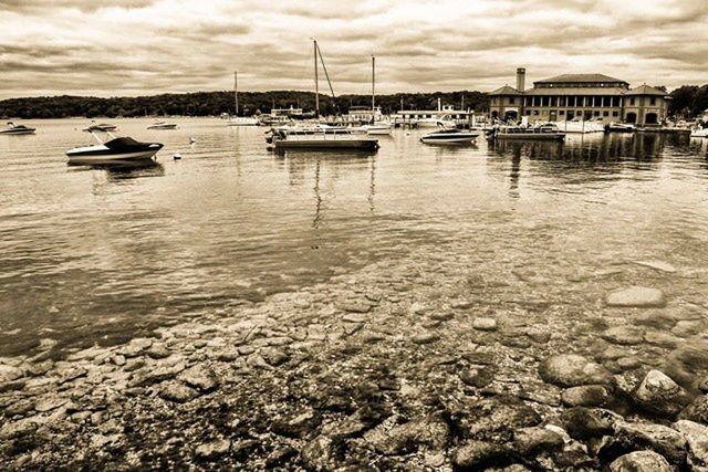 nautical vessel, water, moored, boat, transportation, mode of transport, sky, sea, harbor, cloud - sky, waterfront, sunset, cloud, cloudy, tranquility, rippled, tranquil scene, reflection, nature, built structure