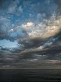 Scenic view of seascape against cloudy sky