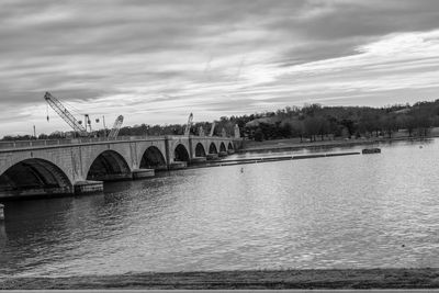 Bridge over river against sky