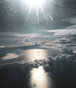 Scenic view of sea against sky on sunny day