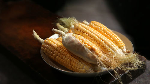 Close-up of corn on table