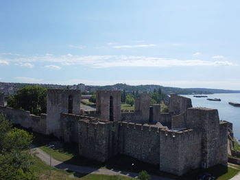 View of castle against cloudy sky