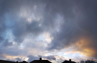 Low angle view of cloudy sky during sunset