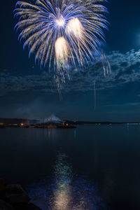 Firework display at night