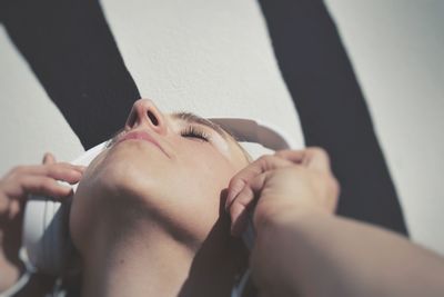 Close-up of woman lying down