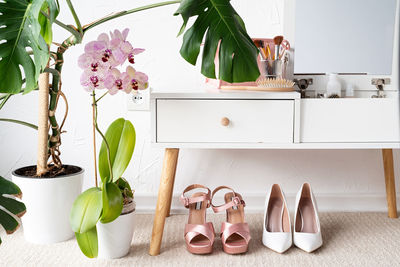 Close-up of shoes on table