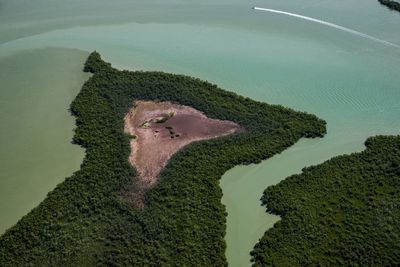 Aerial view of landscape and sea