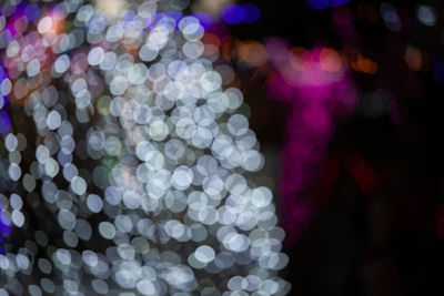 Defocused image of illuminated christmas lights