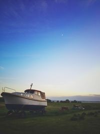 Scenic view of landscape against blue sky