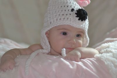 Close-up of cute baby wearing knit hat