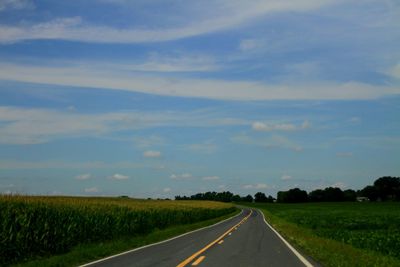 Empty road against sky