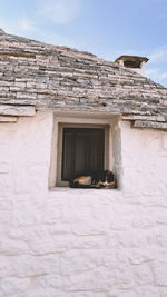 Low angle view of old building against sky