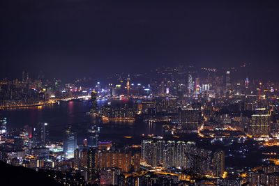 High angle view of illuminated cityscape at night