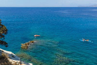 High angle view of blue sea against sky