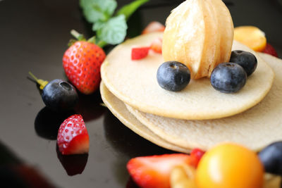 Close-up of fruits in plate
