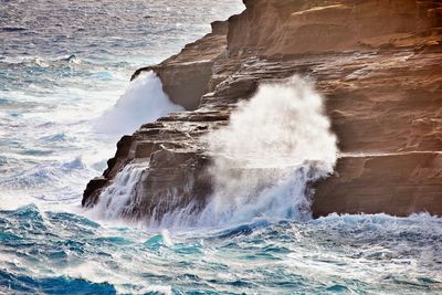 Waves splashing on rocks