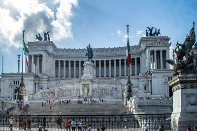 Group of people in front of historical building