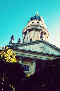 Low angle view of church against clear blue sky