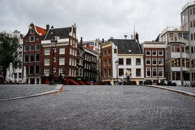 Buildings against sky in amsterdam