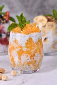 Chia dessert with greek yogurt and orange slices. absolutely helpful. perfect breakfast or snack. 