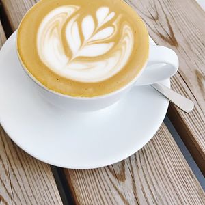 High angle view of cappuccino on table