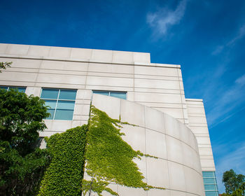 Low angle view of modern building against sky