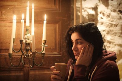 Portrait of woman drinking coffee