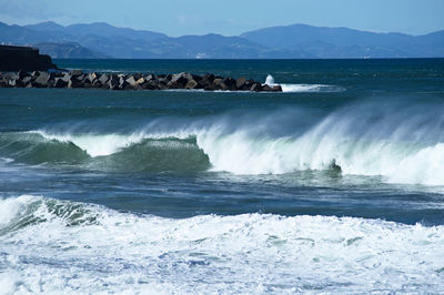 Scenic view of sea against blue sky