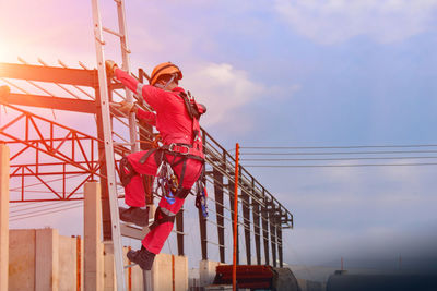 Low angle view of red structure against sky