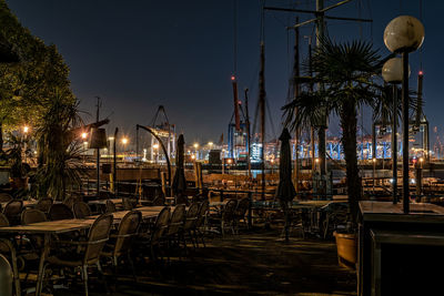 View of illuminated restaurant against sky at night