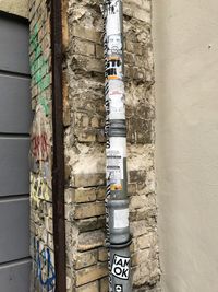 Stack of text on stone wall