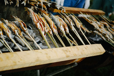 High angle view of fish being prepared on barbecue