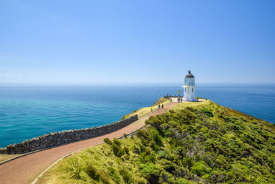 Cape reinga lighthouse and path leading to it, northernmost point of the north island of new zealand